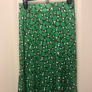 Harold’s knee length green pattern skirt